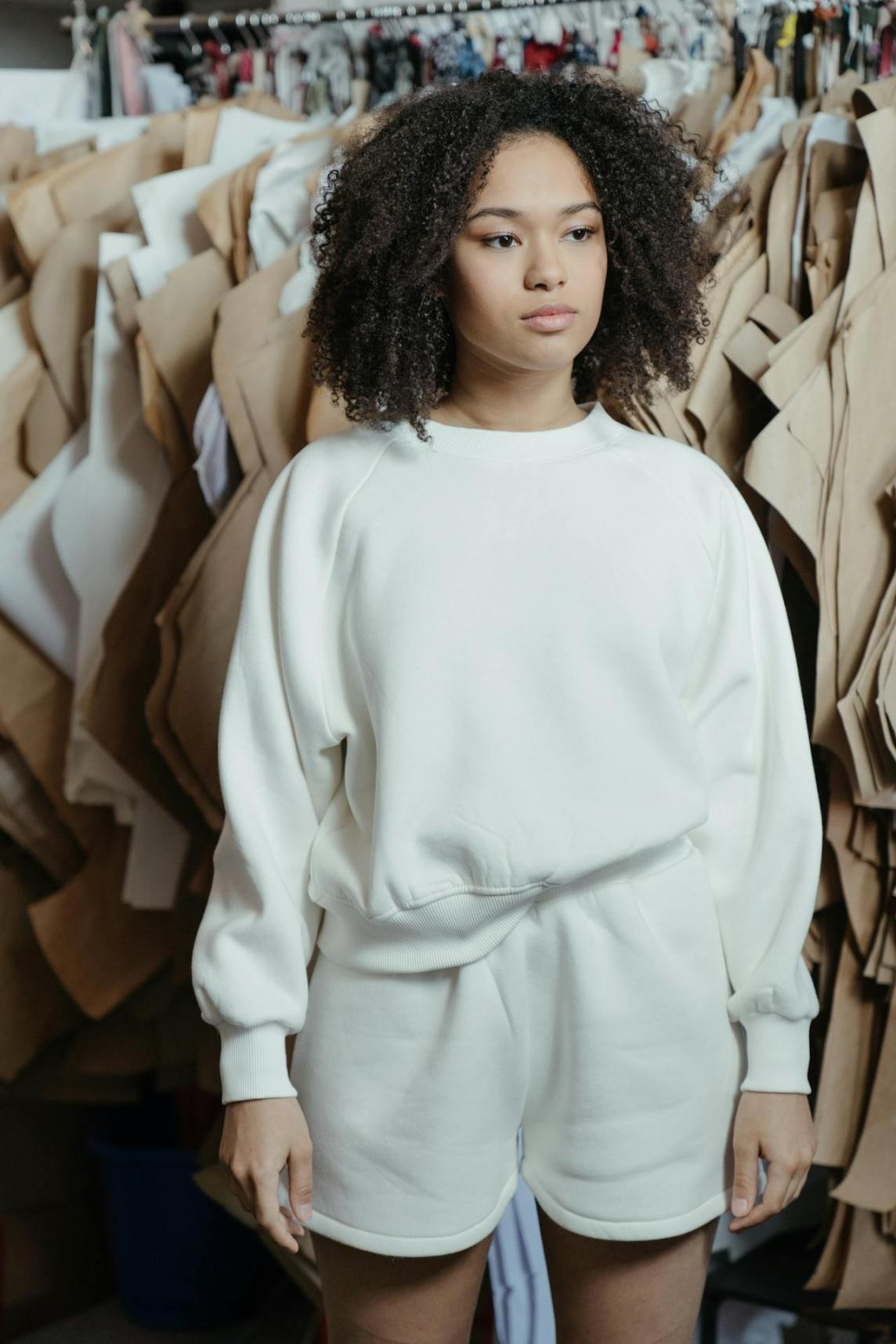 Girl modeling white sweatshirt 